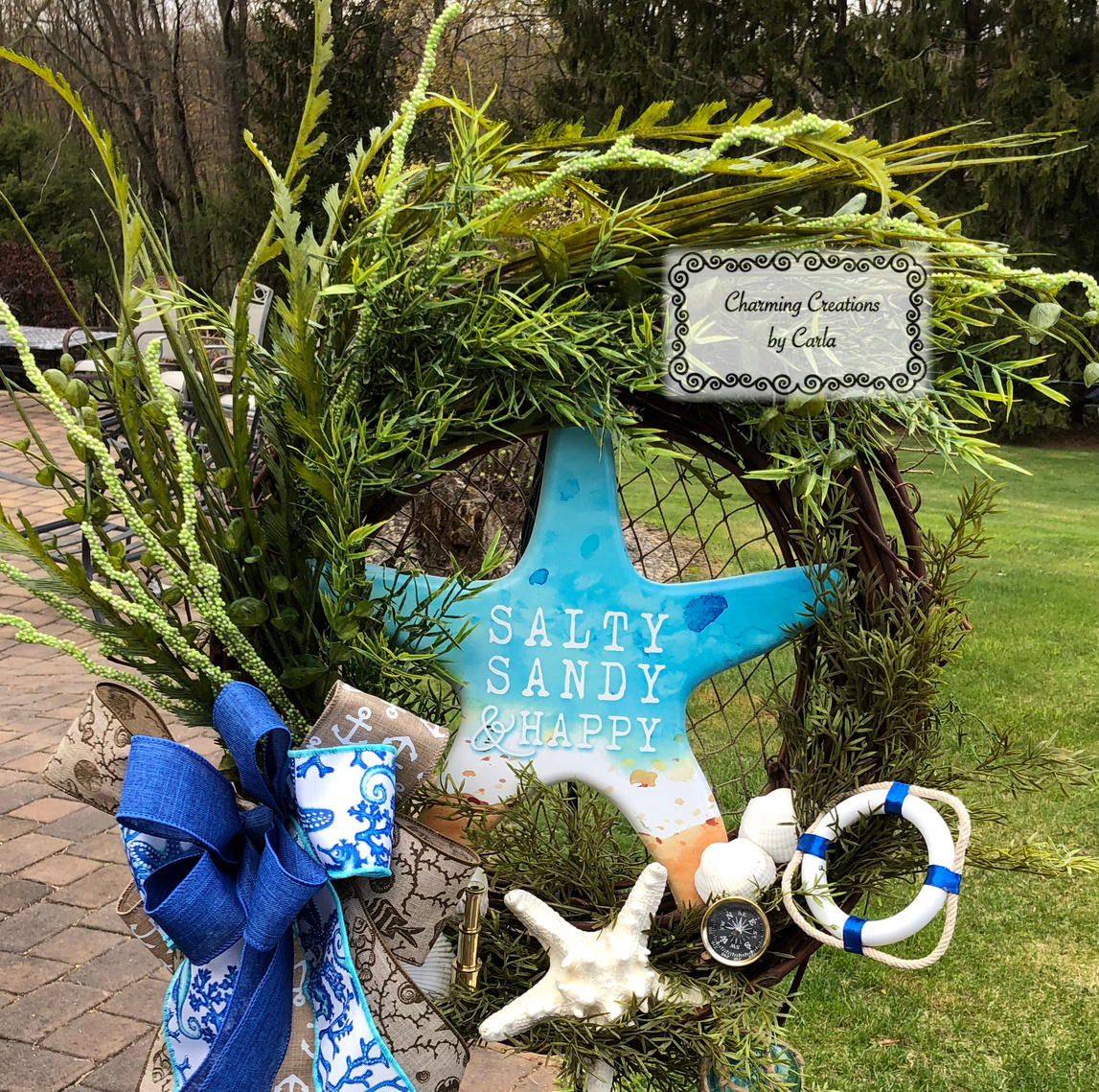 https://charmingcreationsbycarla.com/wp-content/uploads/2021/04/charming-carla-salty-sandy-beach-wreath.jpg