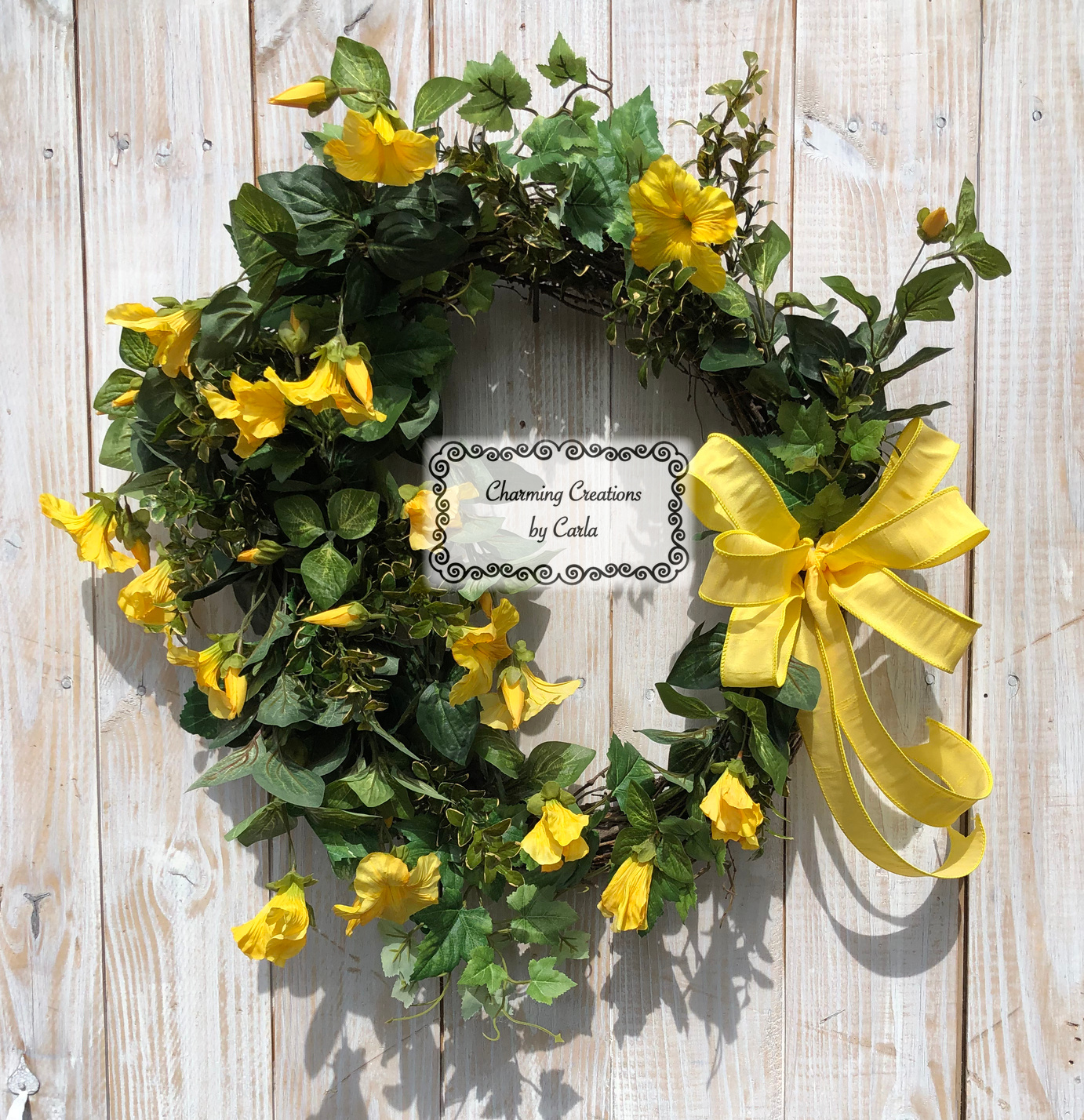 https://charmingcreationsbycarla.com/wp-content/uploads/2021/04/charming-carla-spring-yellow-ivy-wreath.jpg